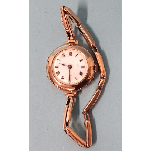 700 - A lady’s 9ct-gold-cased wrist watch on 9ct gold sprung bracelet, (not working), gross weight 2... 