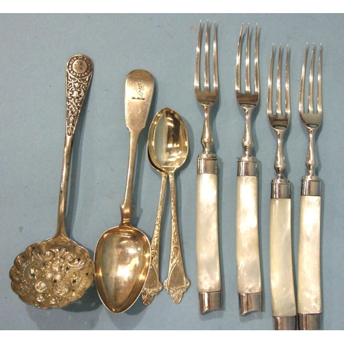 542 - Four mother of pearl-handled silver forks, London 1899, a Victorian silver sifter spoon, London 1897... 