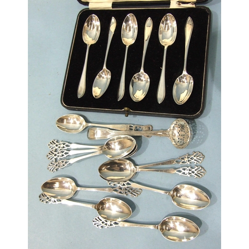 548 - A set of nine silver teaspoons with decorative pierced finials, maker JH, London 1896, a small Georg... 