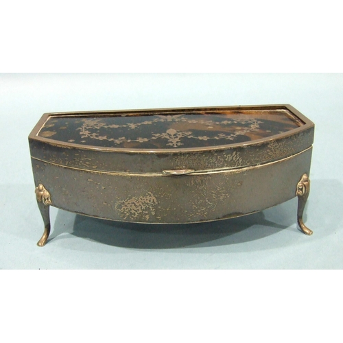 552 - A silver and tortoiseshell trinket box, bow-fronted and raised on four scroll legs, the lid with piq... 