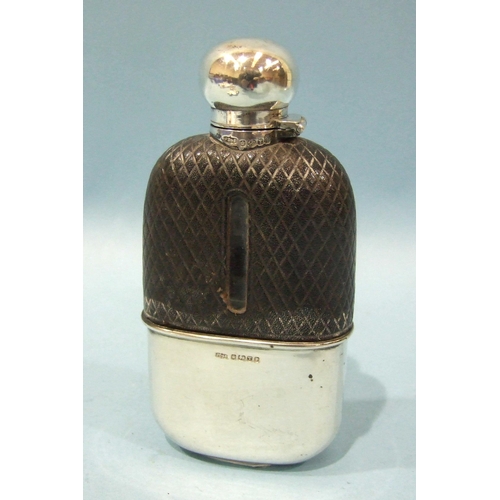 560 - A Victorian leather-covered glass hip flask with silver captive bayonet top and cup, makers James Di... 