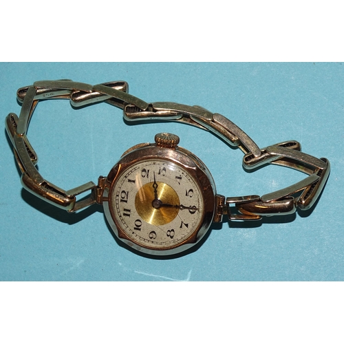 708 - A lady's 9ct-gold-cased wrist watch on 9ct gold sprung bracelet, gross weight 19.4g, (winds and runs... 