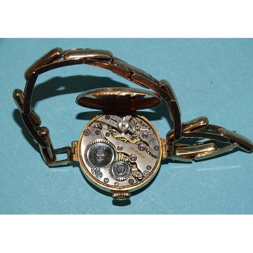 708 - A lady's 9ct-gold-cased wrist watch on 9ct gold sprung bracelet, gross weight 19.4g, (winds and runs... 