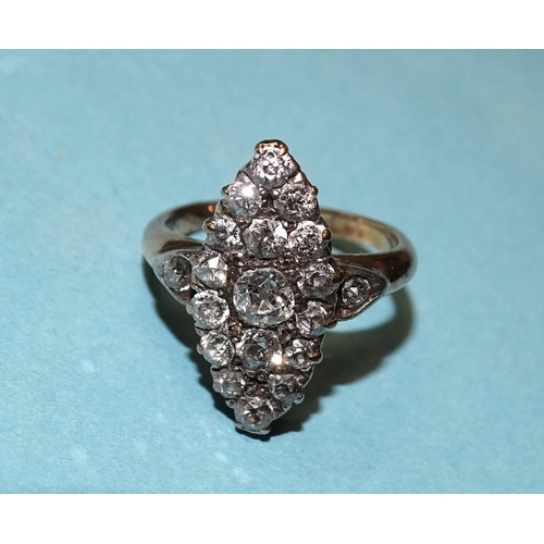 838 - A Victorian diamond marquise cluster ring pavé-set with seventeen old brilliant-cut diamonds,... 