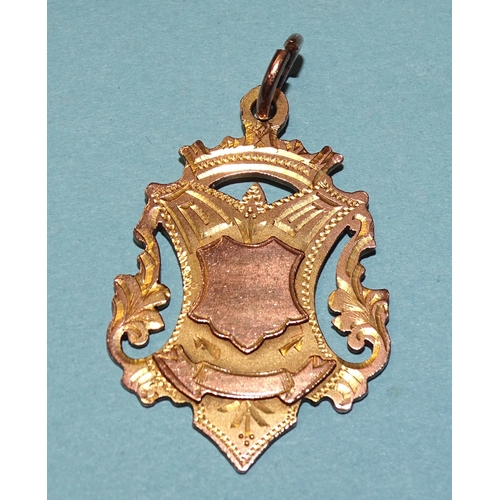 841 - A 9ct gold fob medallion, 8.6g.