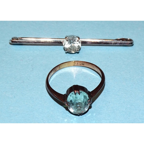 867 - A 9ct white gold bar brooch set pale aquamarine and a 9ct yellow gold ring set pale blue paste stone... 