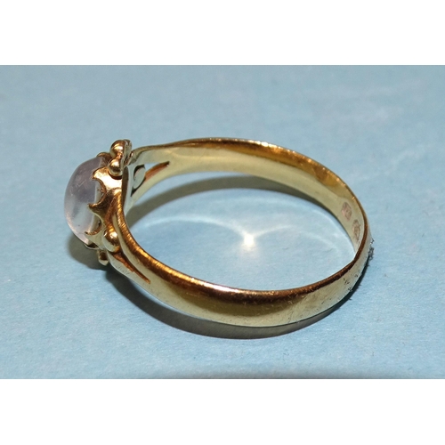 871 - A 22ct gold ring set a moonstone cabochon, (worn), size Q½, 3.4g.