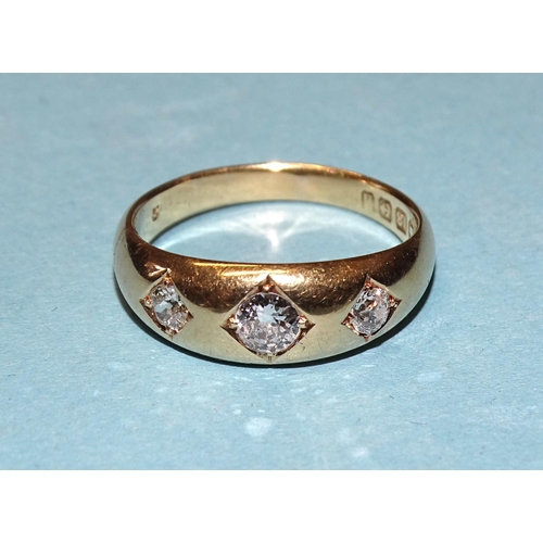 877 - An 18ct gold gypsy ring set three old brilliant-cut diamonds, total diamond weight approximately 0.4... 