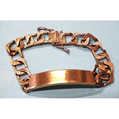 896 - A 9ct gold identity bracelet with textured curb links and concealed clasp, 19cm, 33.8g.... 