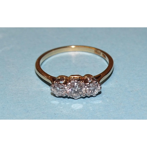 928 - An 18ct gold ring set three brilliant-cut diamonds, total diamond weight approximately 0.5cts, size ... 