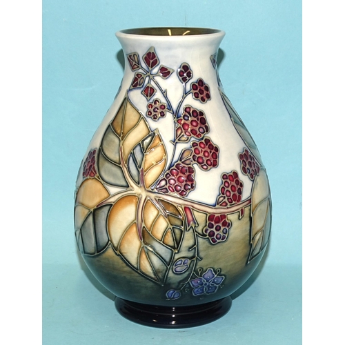 122 - A Moorcroft baluster-shaped vase decorated with tubeline 'Brambles' pattern, factory marks to base, ... 