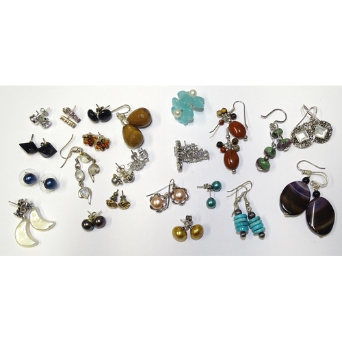 83 - Approximately thirty pairs of silver-mounted gem-set earrings, gross weight 164g.