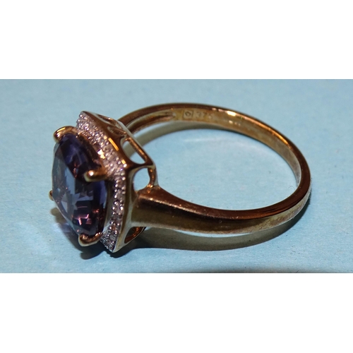 131 - A 9ct gold ring set amethyst and diamond cluster, size R, marked 'QVC', 3.6g.