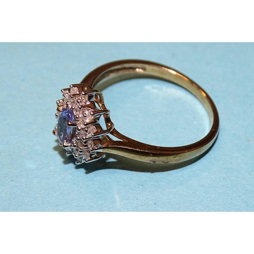 182 - A 9ct gold Tanzanite and diamond cluster ring, marked 'QVC', size R, 2.5g.