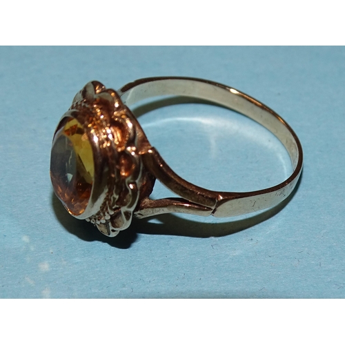 190 - A 9ct gold ring set oval citrine, marks rubbed, size N, 3.5g.