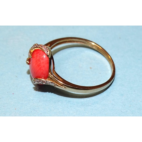 67 - A 9ct gold ring set coral cabochon, in diamond-set mount, size R, marked 'QVC', 2.4g.... 