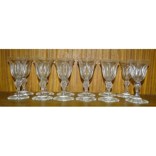 35 - A set of eleven sherry glasses on knopped stems, 12.5cm high and one other, similar, (12).... 