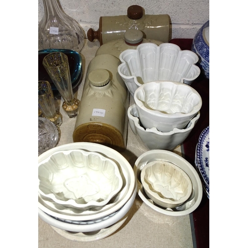 31 - A Shelley ceramic jelly mould, 14cm high, eight other ceramic jelly moulds, (some a/f) and three sto... 