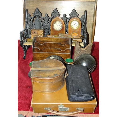 57 - Two ebony bowling balls by Jacques of London, with inscribed white metal mounts, on stands numbered ... 