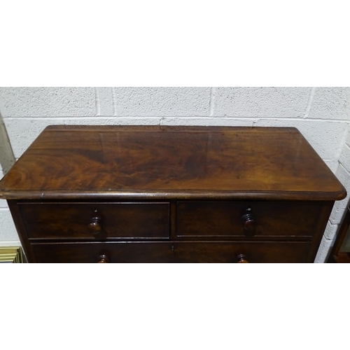 15 - A 19th century rectangular chest of two short and three long cockbeaded drawers, on short turned leg... 