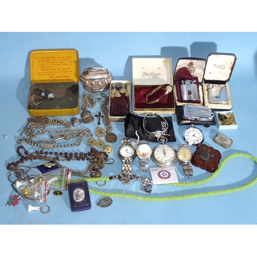 88 - A quantity of wrist watches, a Ronson table lighter, two Ronson lighters, a silver ARP lapel badge a... 