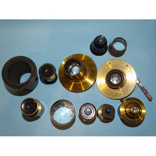 58 - Various lacquered microscope and other lenses, a brass travelling telescope and miscellaneous items.... 