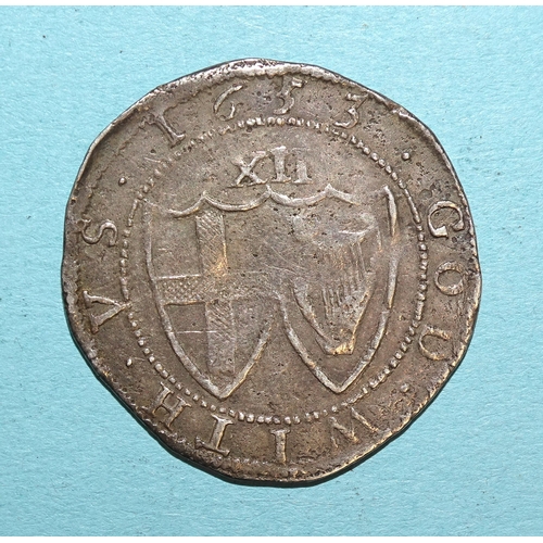 85 - The Commonwealth (1649-1660), a hammered silver 1653 shilling.