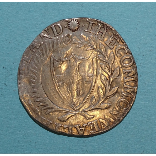 86 - The Commonwealth (1649-1660), a hammered silver 1654 shilling.