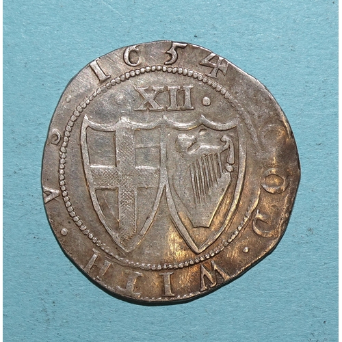 86 - The Commonwealth (1649-1660), a hammered silver 1654 shilling.