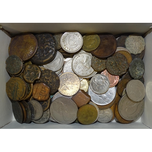 94 - A small collection of foreign silver coinage, including a M. Theresa 1-Thaler, a one-Yen coin, other... 