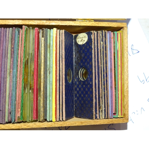 43 - A collection of forty-five Victorian microscope slides.