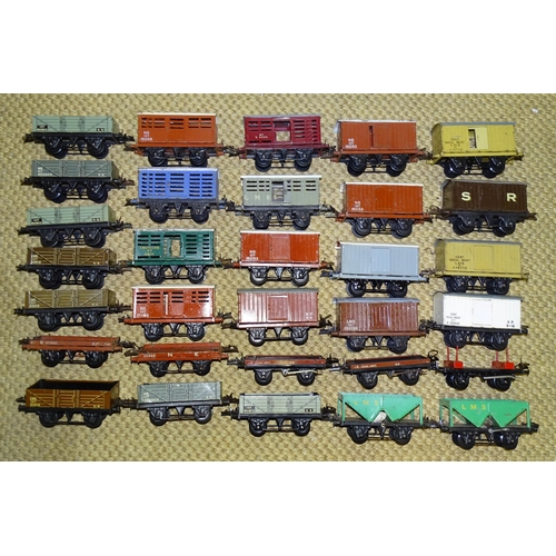 310 - Hornby O gauge, thirty-one wagons for LMS, SR and NE, (31).