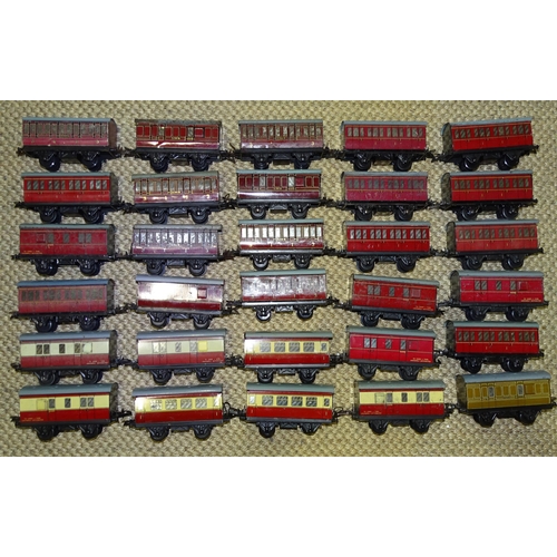 312 - Hornby O gauge, thirty lithographed tinplate coaches, including LMS maroon, 1st/3rd Class and also s... 