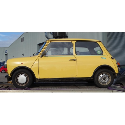 2 - A 1990 Rover Mini 1000 City E two-door saloon motor car, 1L engine, yellow paint, registration G198 ... 