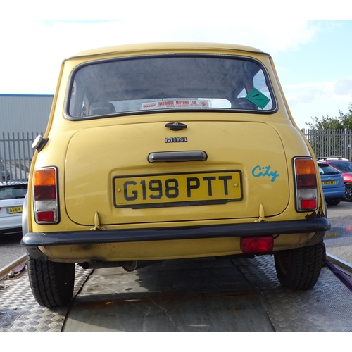 2 - A 1990 Rover Mini 1000 City E two-door saloon motor car, 1L engine, yellow paint, registration G198 ... 