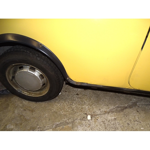 2 - A 1990 Rover Mini 1000 City E two-door saloon motor car, 1L engine, yellow paint, registration G198 ... 