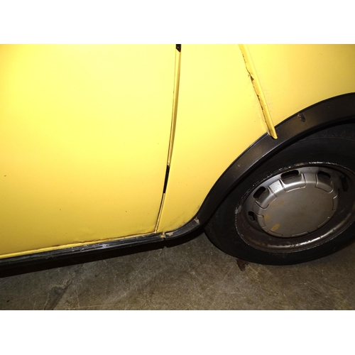 2 - A 1990 Rover Mini 1000 City E two-door saloon motor car, 1L engine, yellow paint, registration G198 ... 