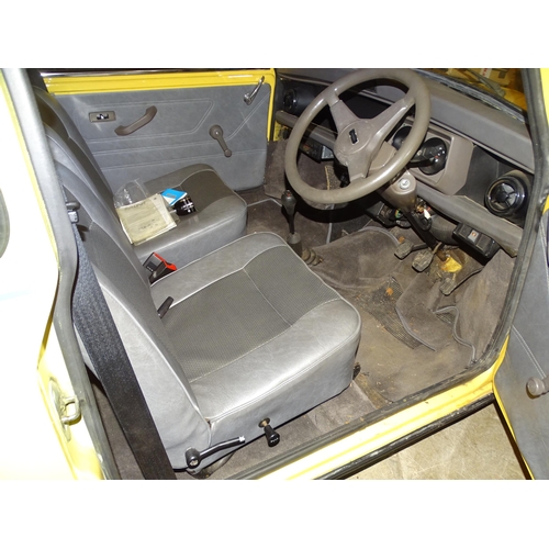 2 - A 1990 Rover Mini 1000 City E two-door saloon motor car, 1L engine, yellow paint, registration G198 ... 