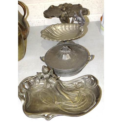 22 - A WMF plated shell-shaped nut bowl mounted with a squirrel, 22cm high, 25cm wide, a reproduction met... 