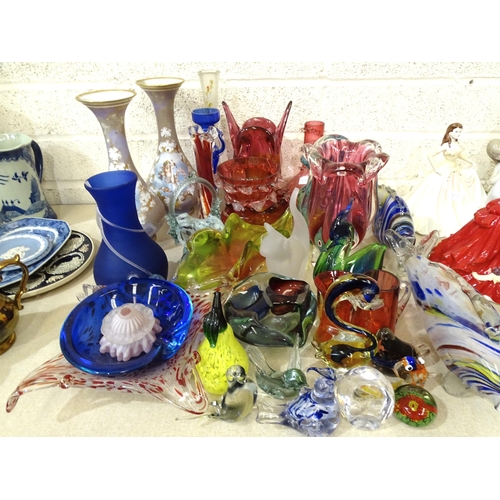 37 - A pair of opaque glass vases decorated with cupids, 29cm high and a collection of coloured glassware... 