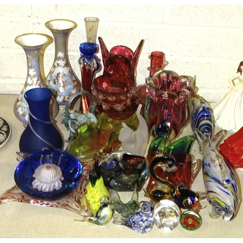 37 - A pair of opaque glass vases decorated with cupids, 29cm high and a collection of coloured glassware... 
