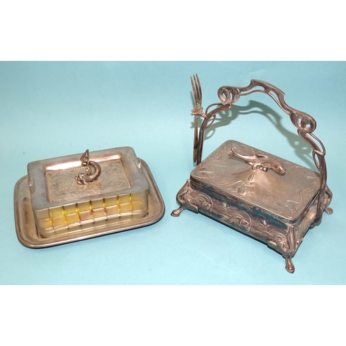 48 - A WMF plated sardine dish and cover of Art Nouveau form, with shaped handle and glass liner, embosse... 