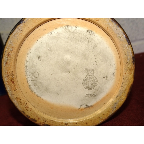 51 - A Royal Doulton stoneware vase of shouldered cylindrical form, the upper part with tube-lined stylis... 
