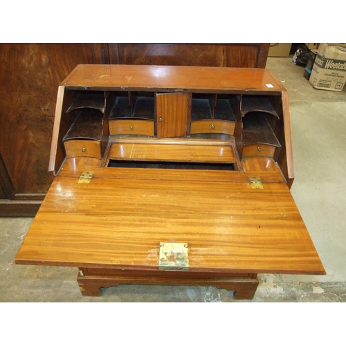 10 - A Georgian satinwood inlaid small bureau, the fall-front with fitted interior and four drawers, 66cm... 