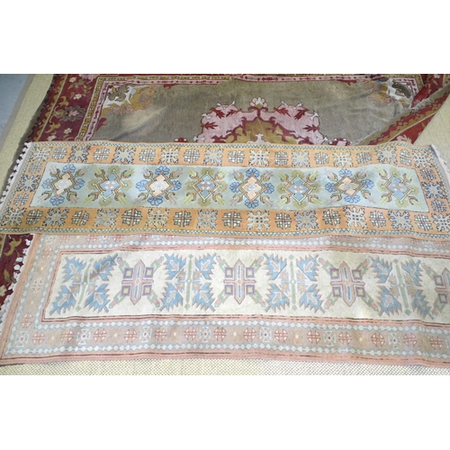 17 - A 20th century wool carpet, 277 x 360cm, (worn and damaged) and two pale-coloured wool corridor rugs... 