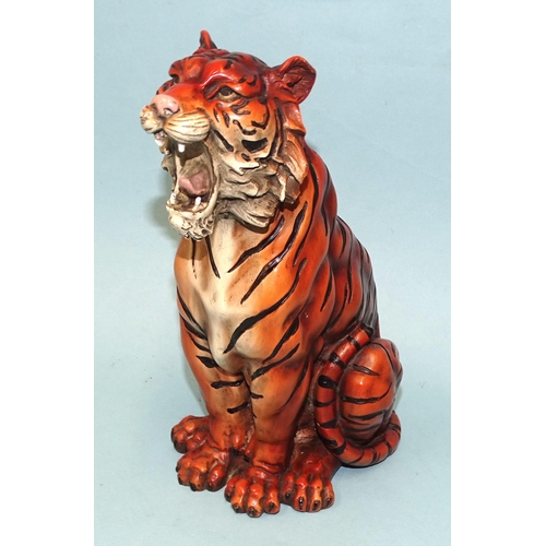 Style of Franz Bergmann, a bronze and painted tiger, seated and roaring, bears factory mark, 21cm high.