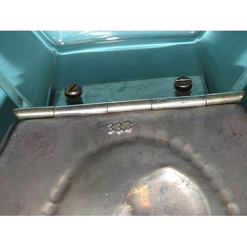64 - A WMF glass box of horseshoe shape fitted with plated lid embossed with a young girl holding cherrie... 
