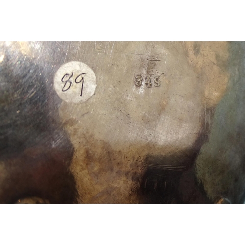 66 - A WMF silver-plated nut dish, modelled as a young boy wearing a hat, kneeling and looking at a frog ... 