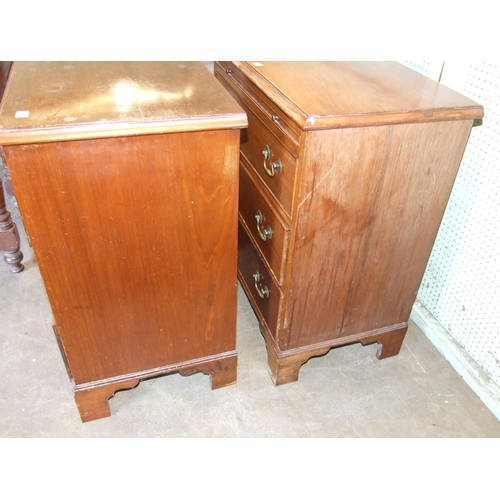 45 - A pair of Georgian-style mahogany bachelors' chests, each with brushing slide above three drawers, o... 