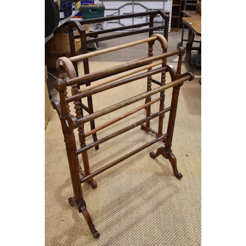 13 - Three Edwardian and later wooden towel rails, (3).